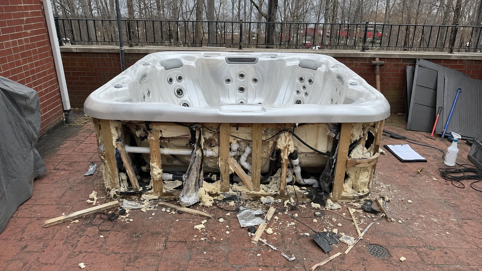 Hot tub partially cut apart during a removal job